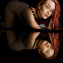 Escort venezolana pelirroja